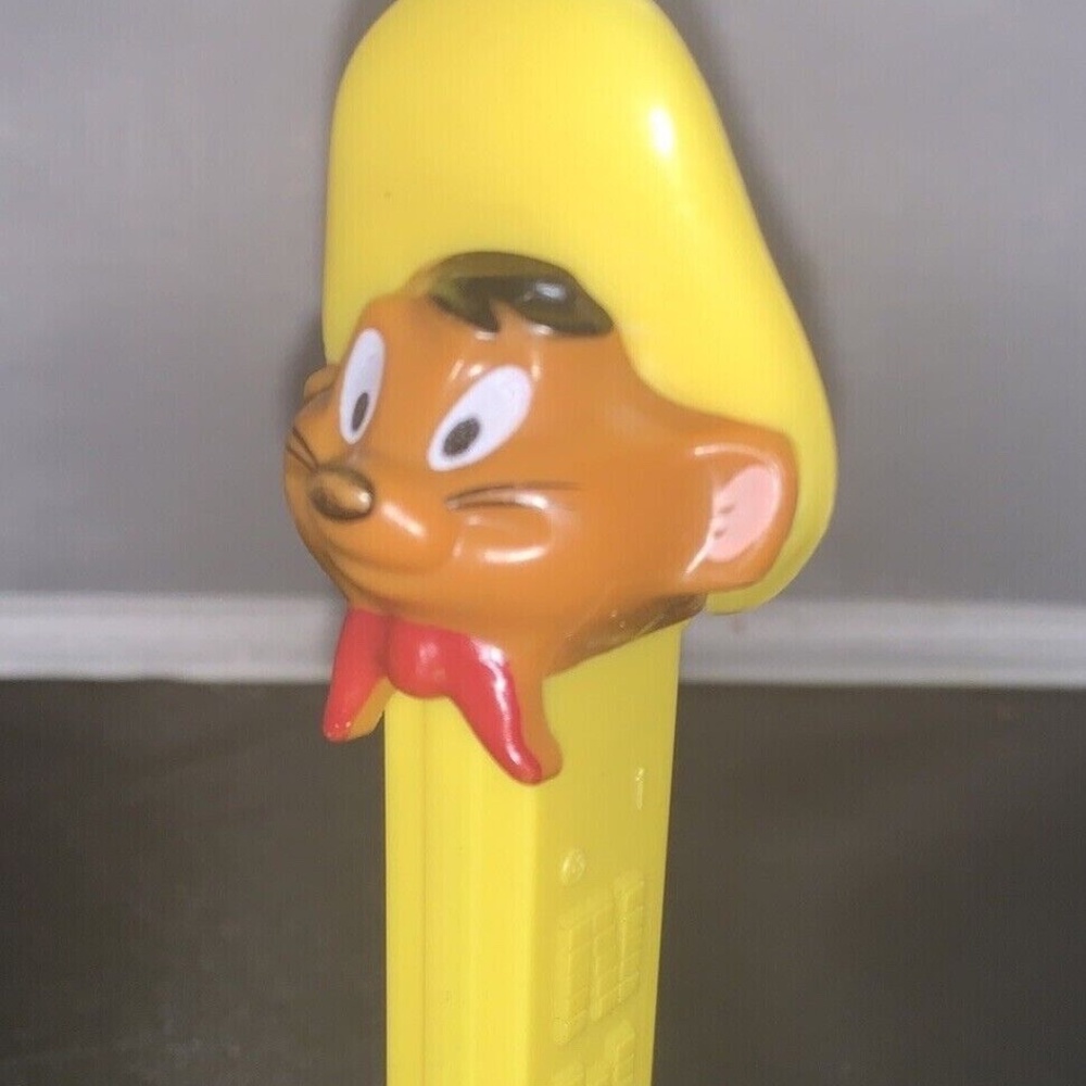 Pez candy dispenser Looney Tunes speedy Gonzalez yellow with feet